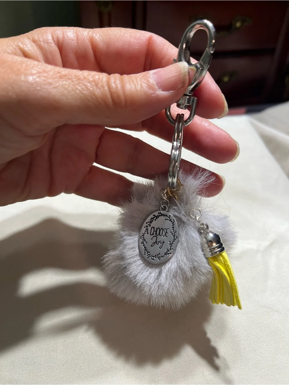 Plush Grey Pom Keychain with 'Choose Joy' Charm & Yellow Tassel
